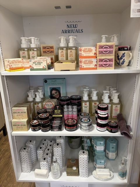 New arrivals shelf of hand soaps, body butters, and bath products at Trendys